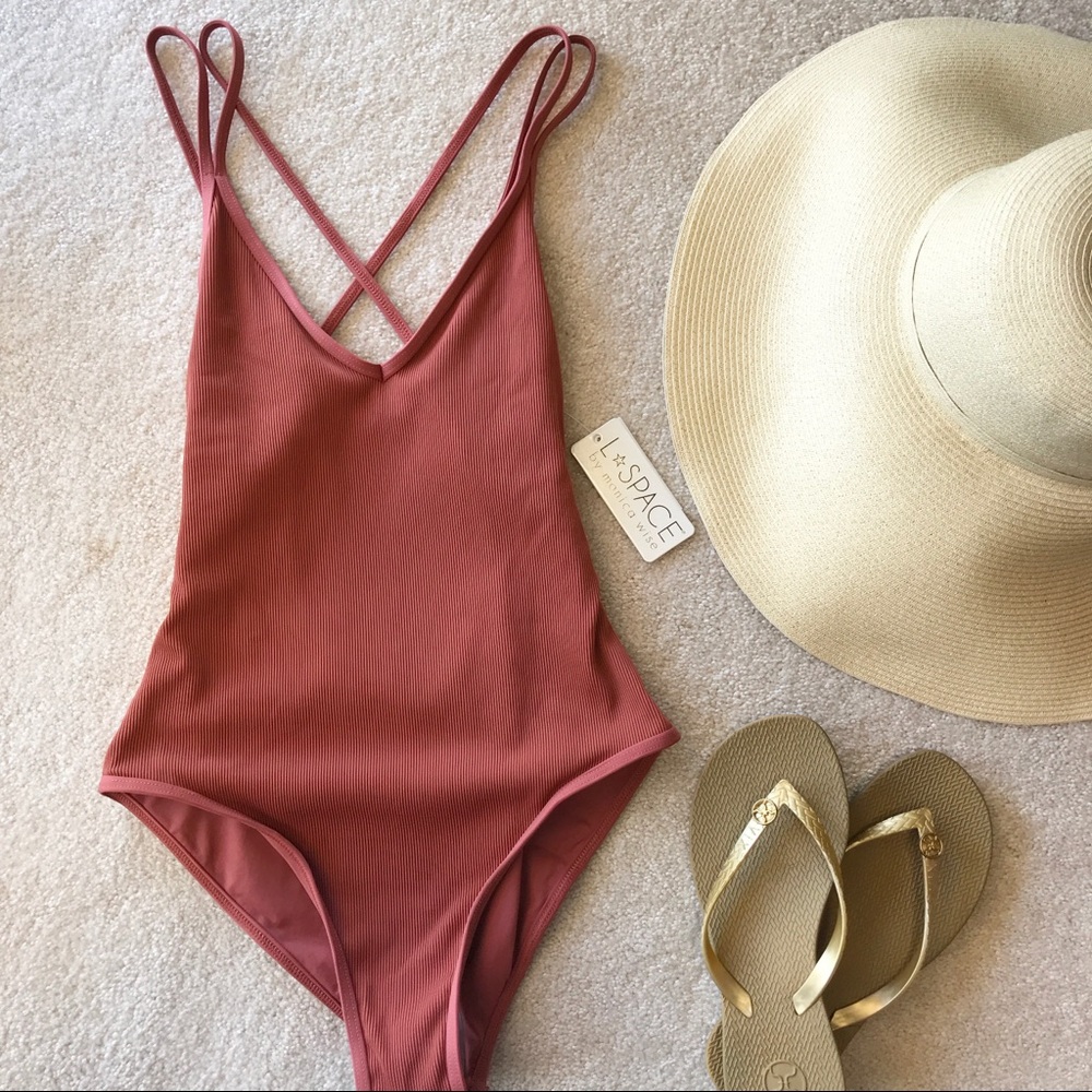 1 piece L-Space. Size 6 worn twice